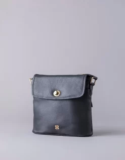 Rickerlea Leather Turn Lock Cross Body Bag In Black